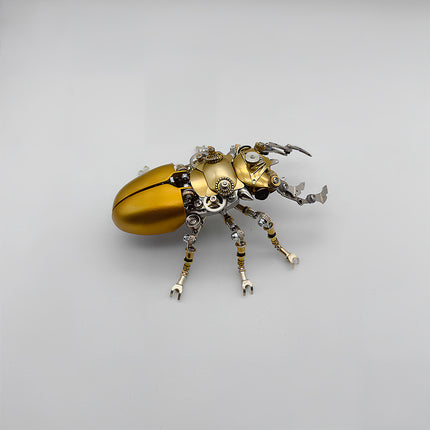 This is a finished Tablefunny steampunk mechanical beetle 3D metal puzzle: Made of gold and silver metal, it replicates the beetle’s form, with a shiny gold curved shell paired with dense gears, axles and other mechanical components. Exquisitely crafted with rich details, it highlights a sense of technology and metallic texture via vintage industrial-style elements—a creative decorative desktop ornament.