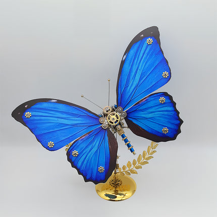 Gear-accented diamond-studded sapphire-blue mechanical butterfly DIY 3D puzzle metal model - lavish funny table decor for art boutique homestays, high-end craft markets & anniversary gifts, assembled from intricate metal kits with gilded leaf stand