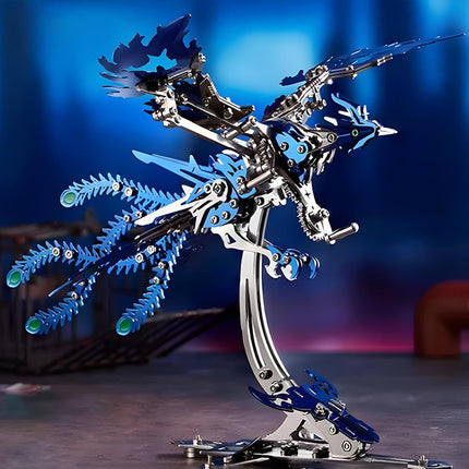  A dynamic blue mechanical phoenix, an intricately designed metal model kit, poised on its stand against a blurred blue background. This metallic 3D puzzle is a true centerpiece.
