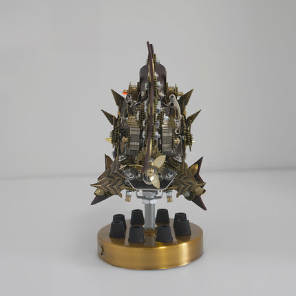 Unique mechanical steampunk fish metal model 3D puzzle Metal Kit, featuring a robust brass and dark metal body, intricate gears, small propellers, and a spiky, armored design, standing on a round brass base. This fascinating steam punk mech is a captivating steampunk puzzle.