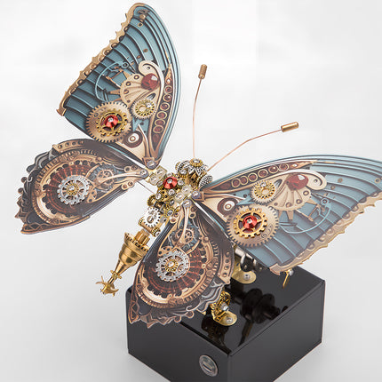 Colorful steampunk butterfly metal model with intricate blue and bronze wings, a vibrant funny table centerpiece. This DIY 3D puzzle metal kit offers a stunning visual appeal and engaging assembly."
