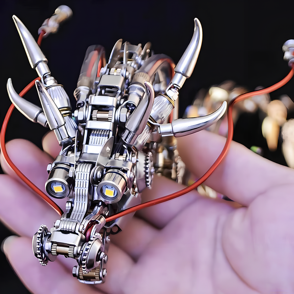 A hand gently holding the detailed head of a metallic dragon model, highlighting its intricate components, horns, and glowing eyes. This small yet complex metal model is a rewarding DIY project, perfect for adding a touch of a funny table aesthetic to any space, available in our 3D puzzle metal kits.