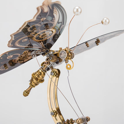 Elegant steampunk butterfly metal model, a beautiful funny table decoration. This DIY 3D puzzle metal kit features intricate clockwork wings and delicate pearl antennae, perfect for sophisticated decor.