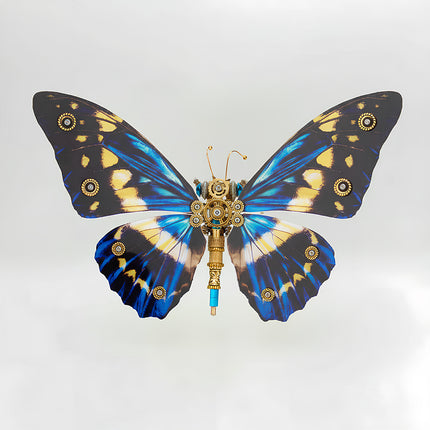 A breathtaking overhead view of a steampunk puzzle, a magnificent mechanical butterfly with wide, vibrant blue, yellow, and black patterned wings, showcasing an intricate gold and silver mechanical body. This symmetrical metal model highlights the profound mechanical steampunk design, making it an impressive 3D puzzle Metal Kit for hobbyists or a captivating steampunk mech display piece that embodies intricate beauty and advanced engineering from above.