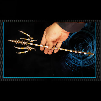 Hand holding an intricately designed metal trident, a perfect accessory for a 3D puzzle Metal Kits or a unique funny table decoration. This DIY piece showcases detailed craftsmanship in metal model making.
