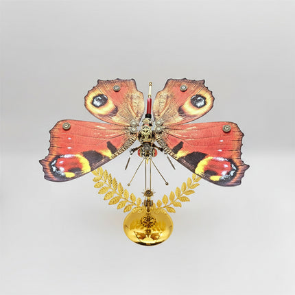 Luxurious red and gold steampunk puzzle butterfly, a premium metal model and 3D puzzle Metal Kit, featuring elaborate mechanical steampunk details for collectors.