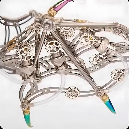 Close-up of the articulated wings of a mechanical dragon, featuring gears, tubes, and iridescent accents. This complex metallic 3D puzzle wing structure is part of an advanced metal model kit.