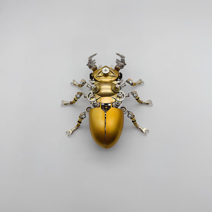 This is a Tablefunny steampunk mechanical beetle 3D metal puzzle kit: Made of gold and silver metal, it replicates the beetle’s form, featuring a shiny gold curved shell paired with mechanical antennae on the head and dense gear components on the limbs. With exquisite craftsmanship and rich details, it highlights a sense of technology and metallic texture via vintage industrial-style elements—a creative and decorative desktop ornament kit.
