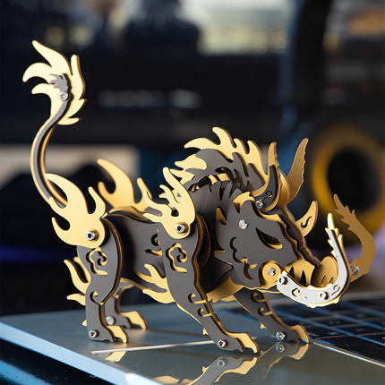 Assembled black and gold 'Dangkang' stylized boar metal model 3D puzzle, elegantly displayed on a laptop, a captivating mechanical steampunk desktop decor or challenging metal kit for enthusiasts.