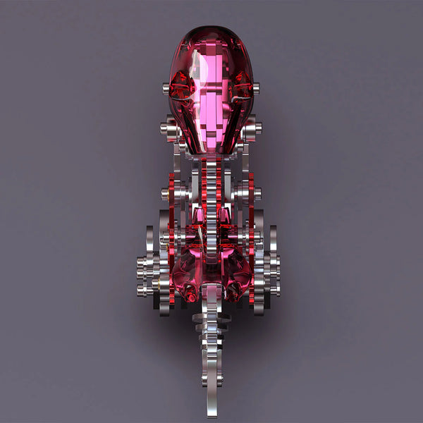 Top-down view of a unique metal model featuring a transparent pink casing over an intricate mechanical steampunk gear skeleton. This 3D puzzle metal kit offers a distinctive steampunk puzzle building experience with vibrant accents.