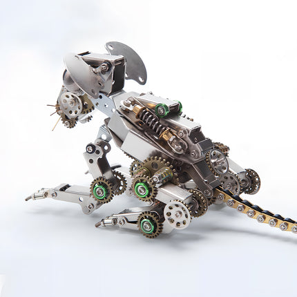 A mechanical mouse metal model kit in a crouching pose, highlighting its articulated limbs, exposed gears, and metallic finish. This metallic 3D puzzle is a unique desk companion.