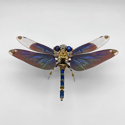 A stunning overhead view of a fully assembled steampunk puzzle, a magnificent mechanical dragonfly with iridescent blue, purple, and clear wings, and a detailed blue and gold body. This intricate metal model showcases exceptional mechanical steampunk design and precision, representing a completed 3D puzzle Metal Kit and a captivating steampunk mech, ready for display.