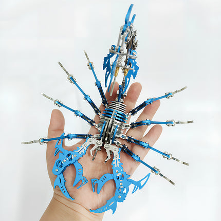 A blue mechanical steampunk scorpion metal model held in a hand to show scale, a detailed DIY steampunk puzzle from our 3D puzzle Metal Kits.