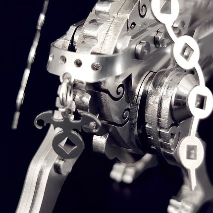 A macro shot of high-precision DIY 3D puzzle Metal Kits parts, highlighting the ornate charms and polished stainless steel surface.
