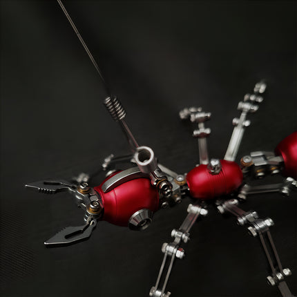 Precision metal parts of a 3D puzzle Metal Kits project, showing the robotic head of a steampunk puzzle ant.