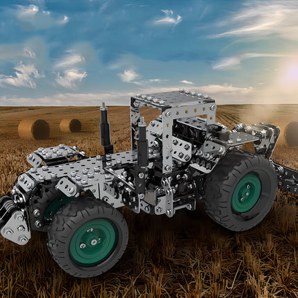 A vintage tractor metal model in a harvest field, designed as an intricate mechanical steampunk project for DIY lovers.
