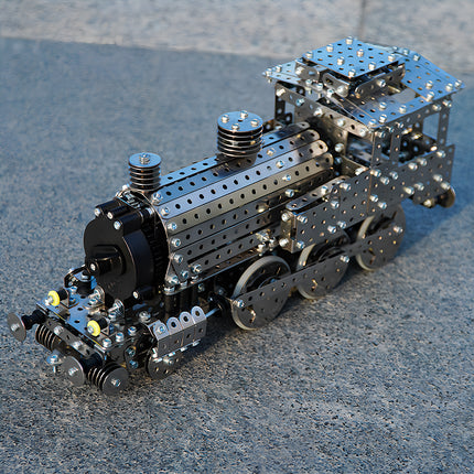 A detailed metal model of a vintage steam locomotive engine, featuring an intricate steampunk puzzle design for DIY enthusiasts.