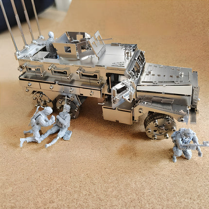 Silver mechanical steampunk style armored transport vehicle, a challenging steampunk puzzle for DIY enthusiasts.
