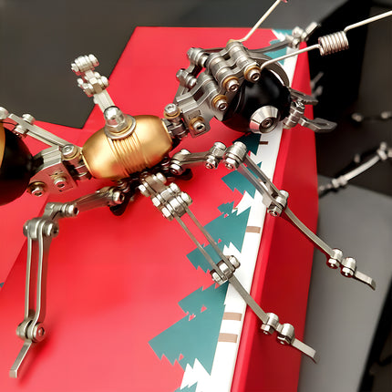 Intricate 3D puzzle Metal Kits showing the assembly of a black and gold metal model ant, a perfect steampunk puzzle for hobbyists.