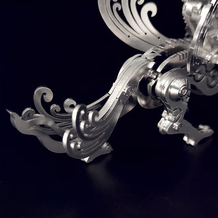 Detailed silver metal model tail. Part of a steampunk puzzle 3D puzzle Metal Kits assembly. High-quality DIY mechanical beast.
