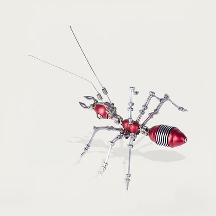 Red and silver mechanical ant metal model, an intricate 3D puzzle Metal Kits featuring mechanical steampunk aesthetics.