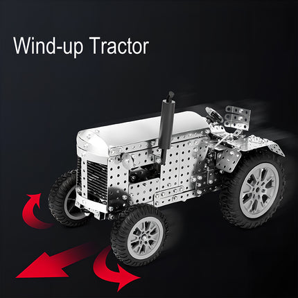 A functional wind-up tractor metal model featuring a mechanical steampunk gear system that allows it to move.