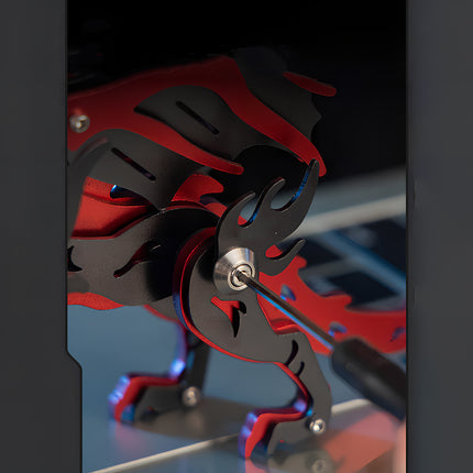 Using a tool to tighten a screw joint on the red and black mechanical steampunk 3D puzzle metal dragon kit.