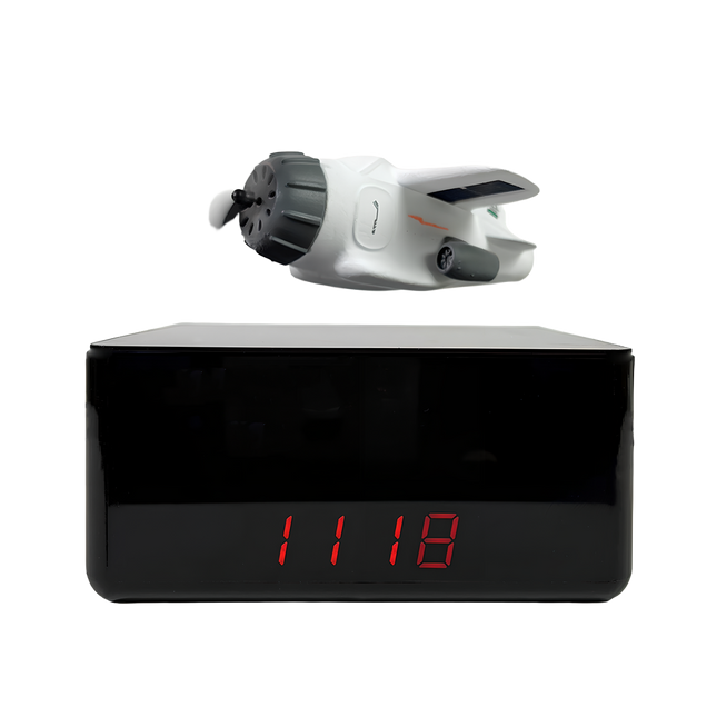 White model airplane levitating above a black rectangular base with red LED display via magnetic levitation – modern anti-gravity desk gadget