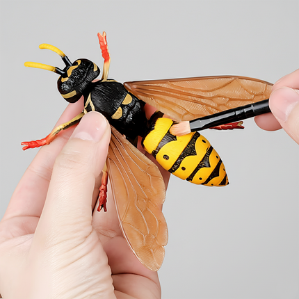 A realistic wasp model toy, classified as a static, solid early childhood educational and craft toy. Crafted from hard plastic, it faithfully replicates the biological features of a wasp: black-and-yellow striped body, transparent textured wings, yellow antennae, and red legs, with exceptionally lifelike detailing.