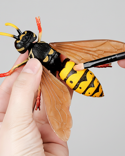 A realistic wasp model toy, classified as a static, solid early childhood educational and craft toy. Crafted from hard plastic, it faithfully replicates the biological features of a wasp: black-and-yellow striped body, transparent textured wings, yellow antennae, and red legs, with exceptionally lifelike detailing.