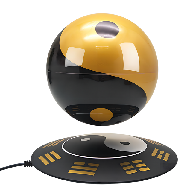 Floating Tai Chi orb on Feng Shui base, symbolizing balance and harmony for desk decor