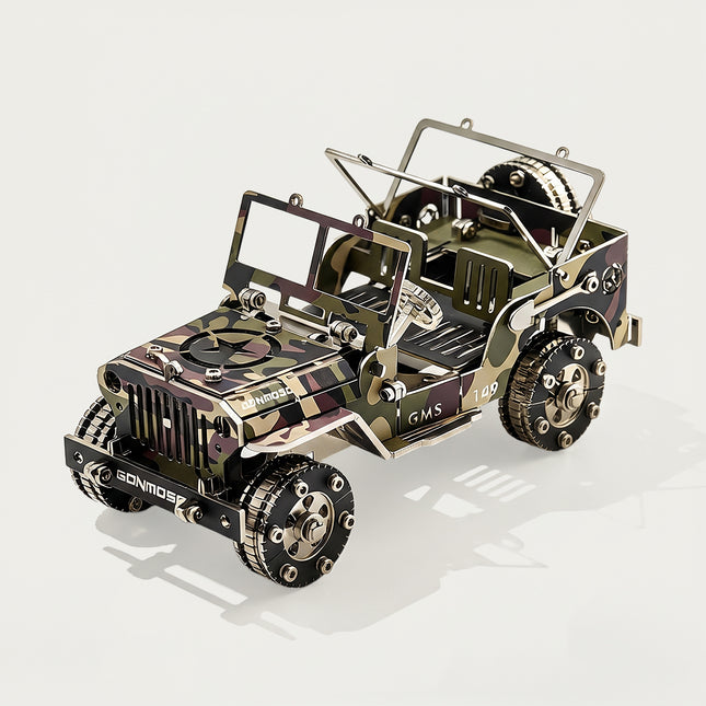 A fully assembled camo willys jeep metal puzzle shown from a front 3/4 high angle on a clean white background, highlighting its realistic military camouflage, open cabin interior, and soft realistic shadows.