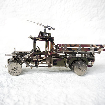 Flat side view of a camouflage military truck 3D puzzle metal kit with mounted turret and detailed chassis.
