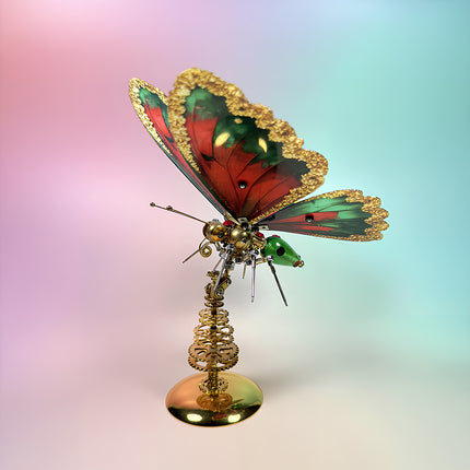 Holiday edition 3D puzzle Metal Kit of a steampunk puzzle butterfly featuring red and green wings and an industrial gear base.