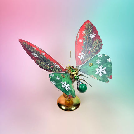 Detailed steam punk mech butterfly figurine from tablefunny with holiday colors and intricate gear design, a collectible metal model.