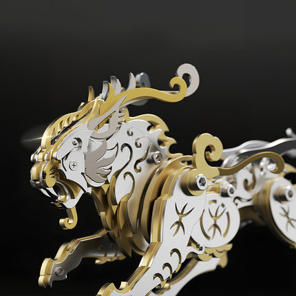 A detailed close-up view of the gold and silver mechanical Bi'an DIY metal puzzle model, showcasing the intricate metalwork of the mythical dragon son's head, from tablefunny.com.