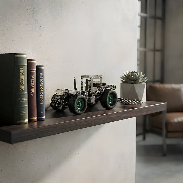 Assembled DIY metallic mechanical tractor model puzzle styled as an elegant bookshelf decoration and home office desk ornament.