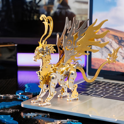 A golden mechanical steampunk beast standing on a laptop keyboard, a premium metal model for creative desktop setups.