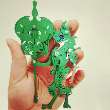 Size reference of green steam punk mech metal model held in hand