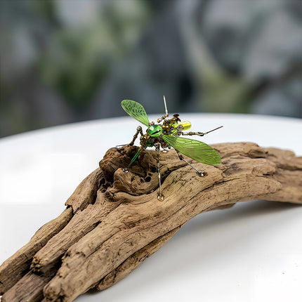 Completed 3D puzzle Metal Kits featuring an artistic green insect, high-quality metal model for hobbyists and collectors.