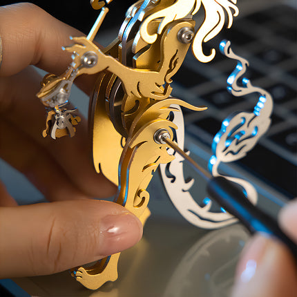 DIY assembly process of gold steam punk mech metal model using a screwdriver