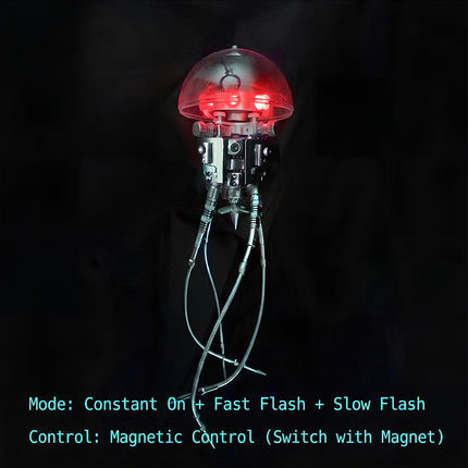 Feature diagram showing the magnetic control red LED light with constant on, fast flash, and slow flash modes on a 3D metal mechanical jellyfish model against a dark background.