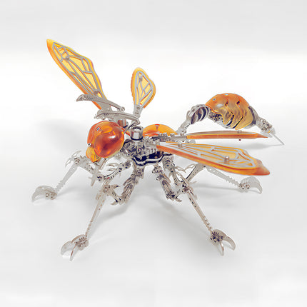 Mechanical steampunk puzzle featuring an orange amber wasp insect with articulated claw legs for desk display.