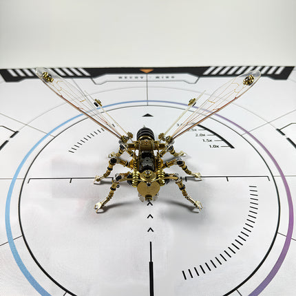 Challenging steampunk puzzle bee in metallic gold and black, a highly detailed metal model for professional desktop collectors.