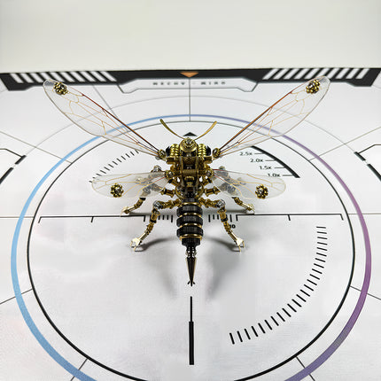 Precision-engineered steampunk puzzle robotic insect on a technical calibration mat, showcasing the detail of our metal model collection.