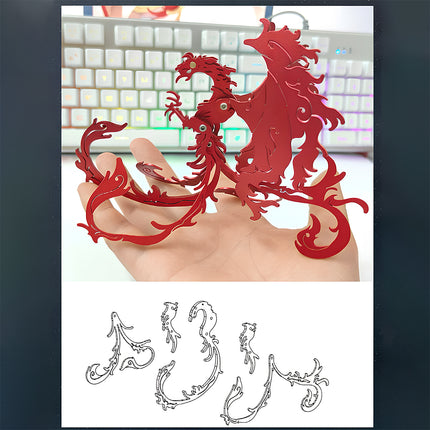 A completed red mechanical steampunk Zhuque phoenix 3D puzzle held in hand, showing its matching line art parts diagram.