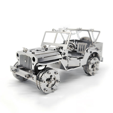 Front-left three-quarter view of a silver military jeep 3d metal puzzle kit, showcasing the classic grille, star emblem on the hood, and detailed mechanical wheels on a white background.