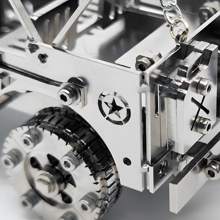 Extreme macro close-up view of a silver military jeep 3d puzzle, highlighting the mechanical hex screws, die-cut star insignia, and layered gear wheels.