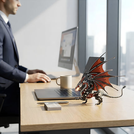 An assembled red and black 3D metal mechanical dragon model displayed on a wooden executive desk in a modern office.