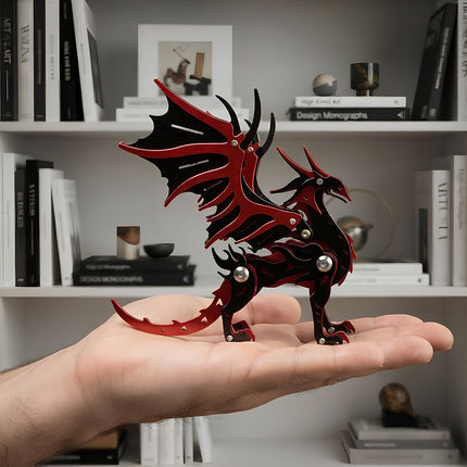 Intricate red and black metallic mechanical dragon sculpture displayed as a unique modern desk ornament.